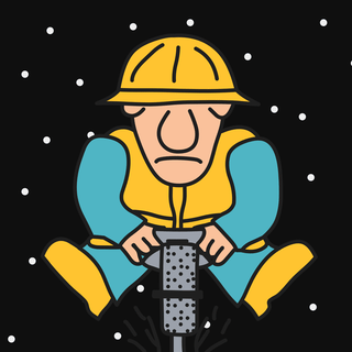 Construction worker using a jackhammer
